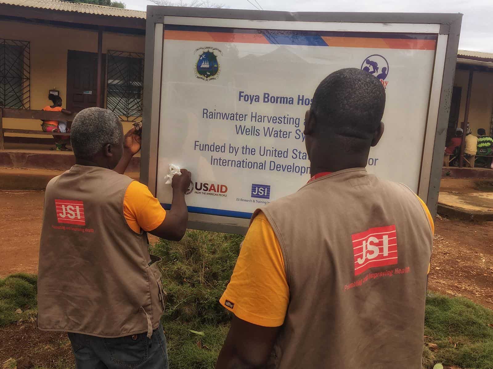 USAID dedicated a rainwater harvester and wells constructed by JSI to supply water to two hospitals in Lofa County, Liberia.