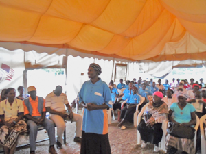 Victoria Achieng, speaks about providing iCCM at a community event. Photo courtesy of Herman Jaoko, Kenya.