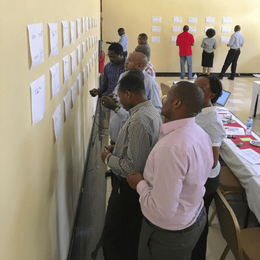 Workshop participants defining requirements for a Health Information Mediator in Tanzania.