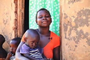 A mother with her child who was successfully treated by an MCSP supported health facility. 