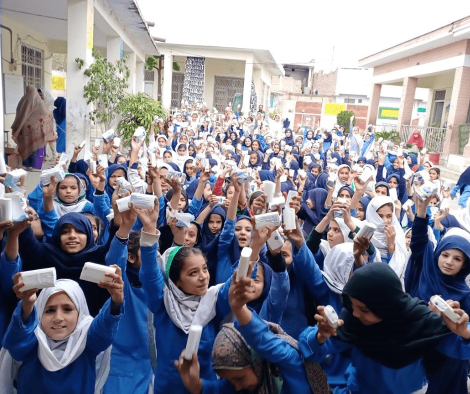 Schoolchildren demonstrate their new handwashing knowledge